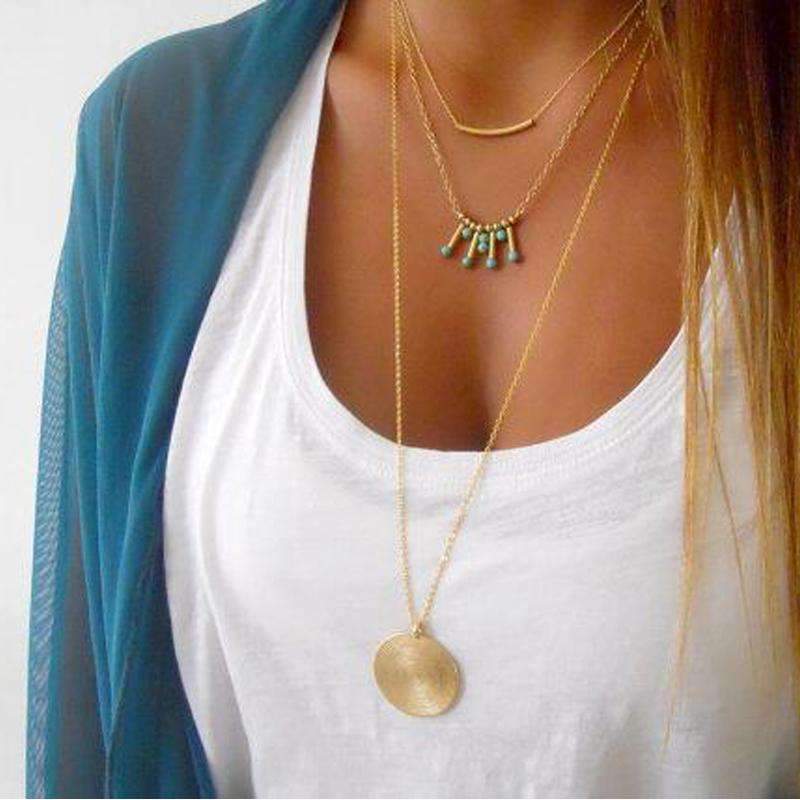 Gold Layered Necklace with Turquoise Bead Accents and Round Pendant